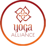 Yoga Alliance logo featuring an intricate design and the words 'yoga' and 'ALLIANCE' in a stylized font.